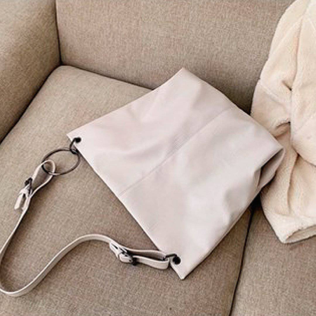 Nehwei Enterprise CeCe shoulder bag in black leather with gold-tone hardware and adjustable strap.