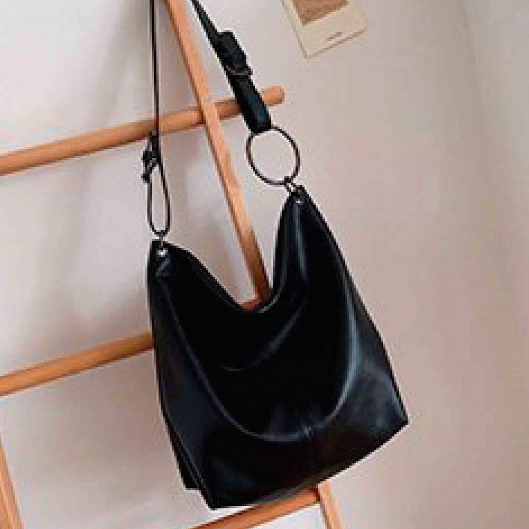 Nehwei Enterprise CeCe shoulder bag in soft leather with adjustable strap and gold-tone hardware, stylish and functional accessory