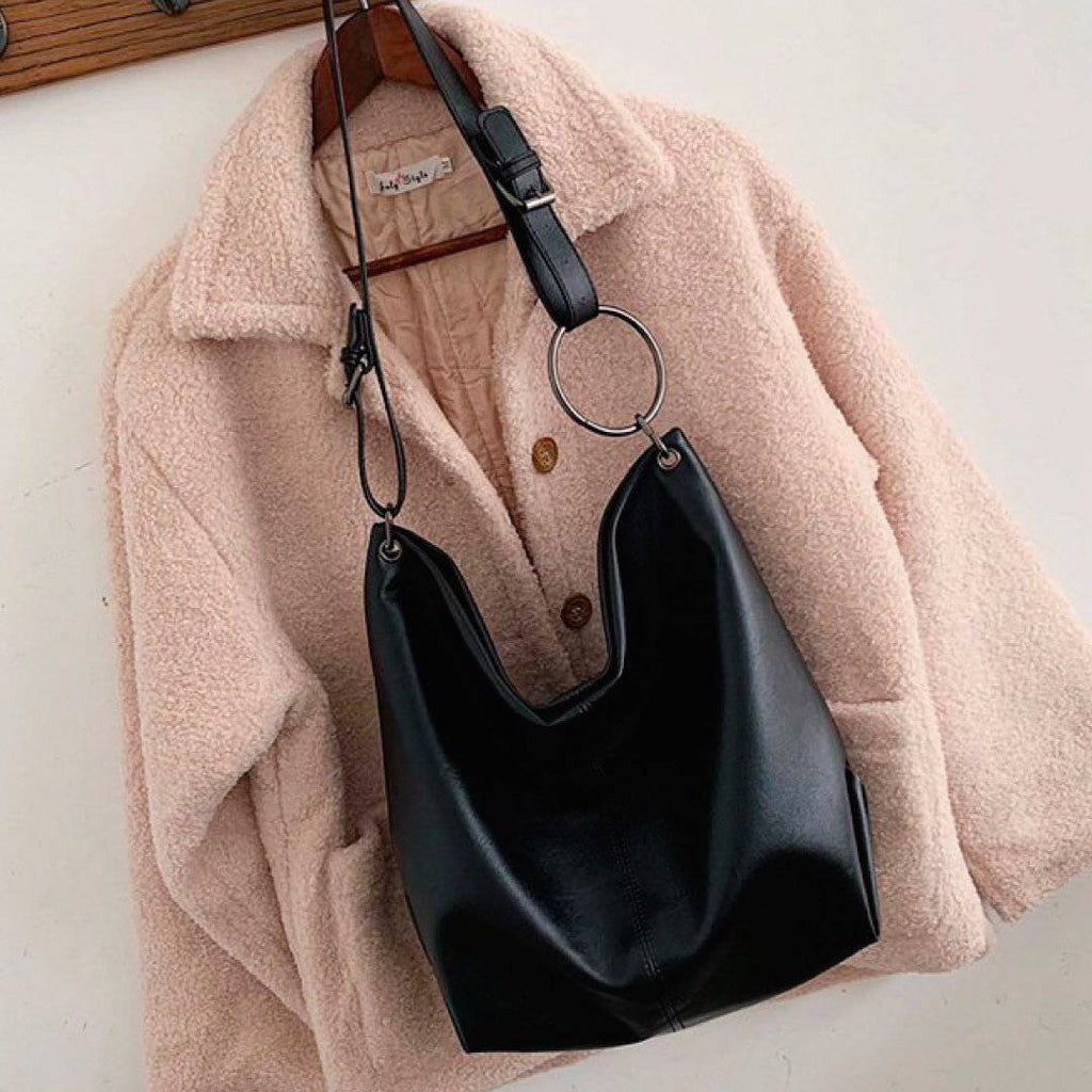 Nehwei Enterprise CeCe shoulder bag in stylish design, featuring a sleek shape and elegant strap for everyday use.