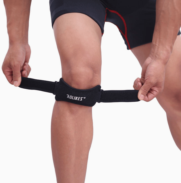Nehwei Enterprise electric knee massager with adjustable straps and remote control for soothing knee pain relief.