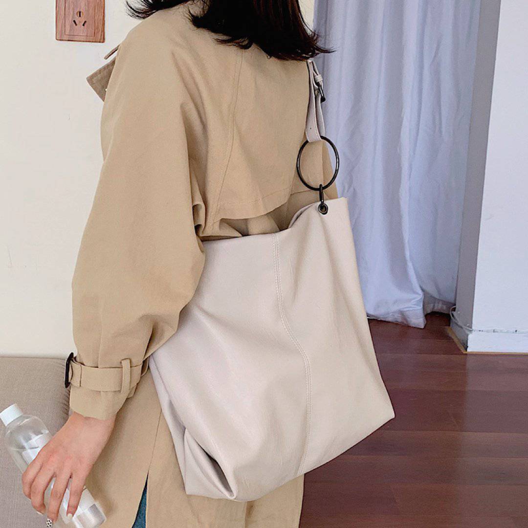 Nehwei Enterprise CeCe Shoulder Bag with adjustable strap, stylish design, and spacious interior for everyday use.