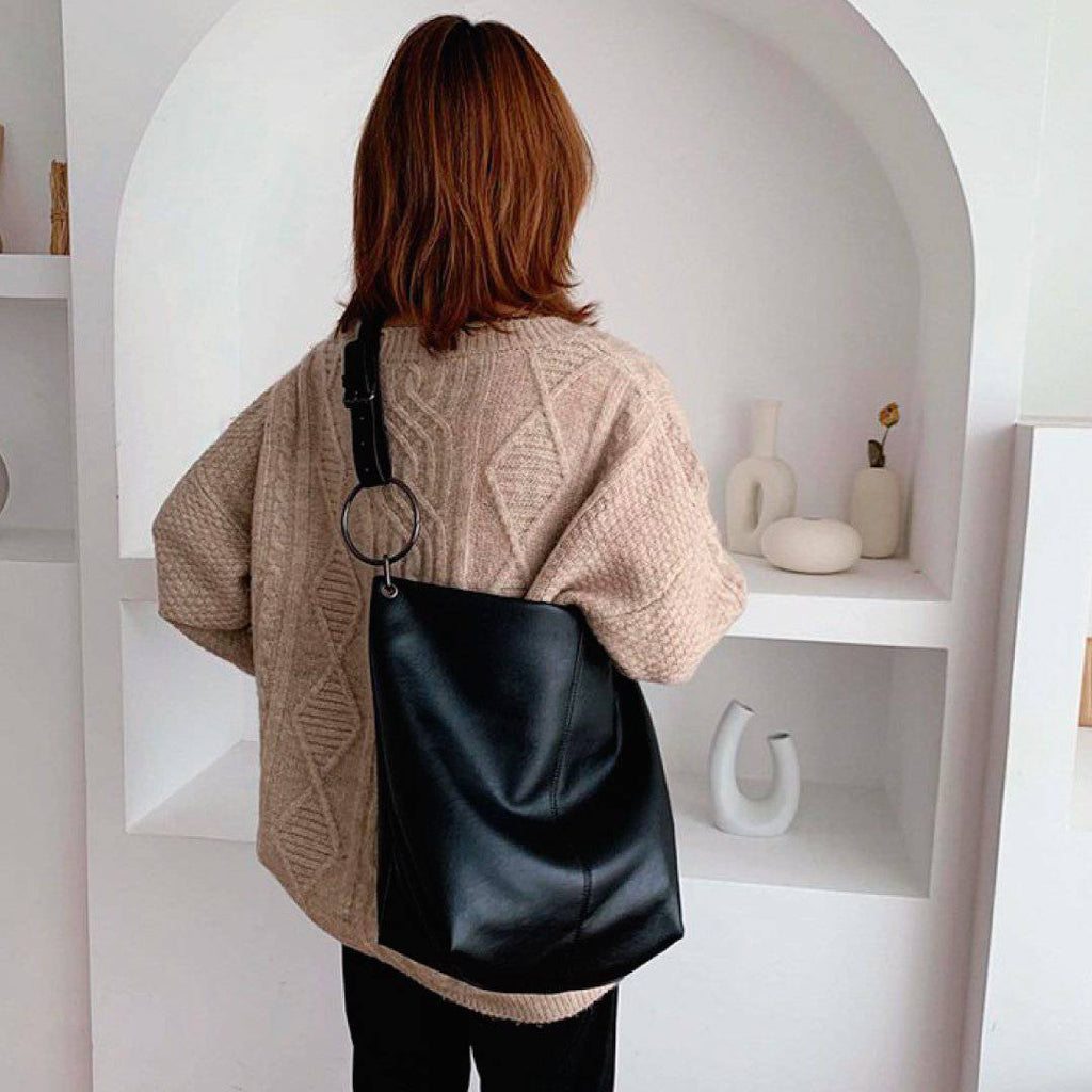 Nehwei enterprise CeCe shoulder bag in stylish leather with adjustable strap and spacious interior.