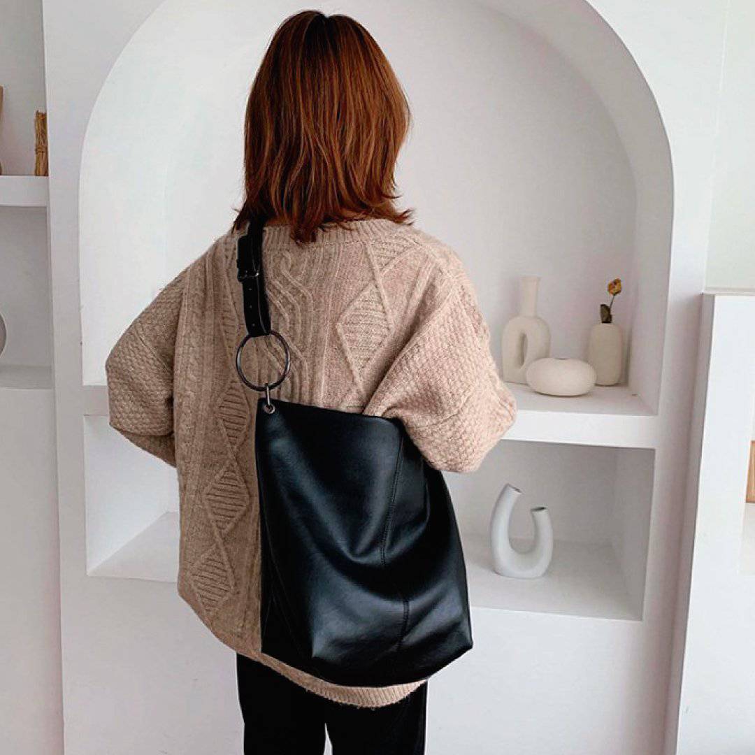 Nehwei enterprise CeCe shoulder bag in stylish leather with adjustable strap and spacious interior.