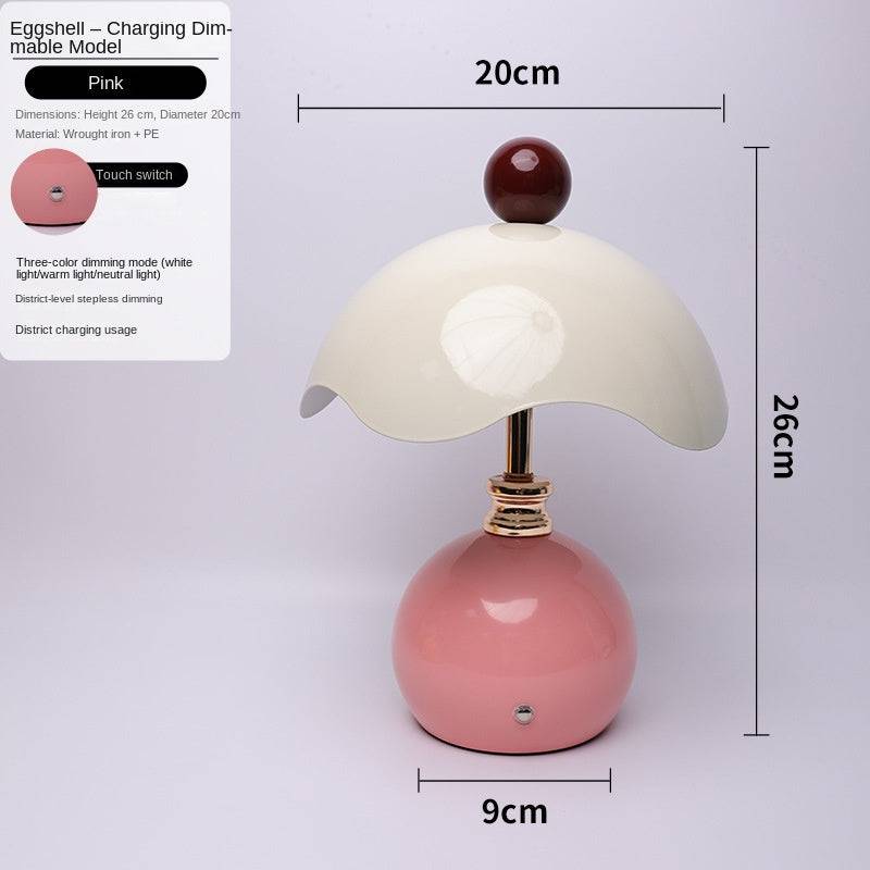 Shell-shaped table lamp by eprolo with a minimalist design, ideal as a bedroom night light or wedding gift, with warm lighting.