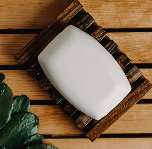 Cream-colored coconut bar soap by My Store with a smooth rectangular shape, shown in a close-up image.