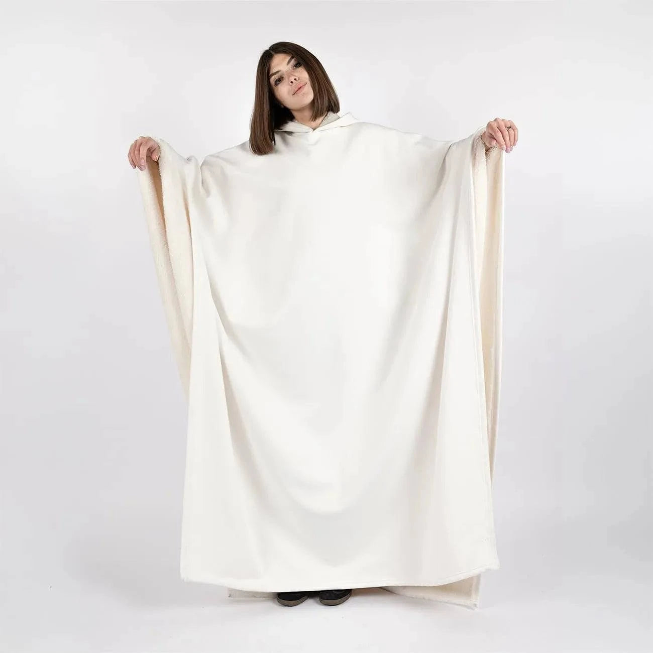 Unisex Eden oversized hoodie cloak by Nehwei enterprise with soft faux fur lining, lightweight and warm winter clothing.