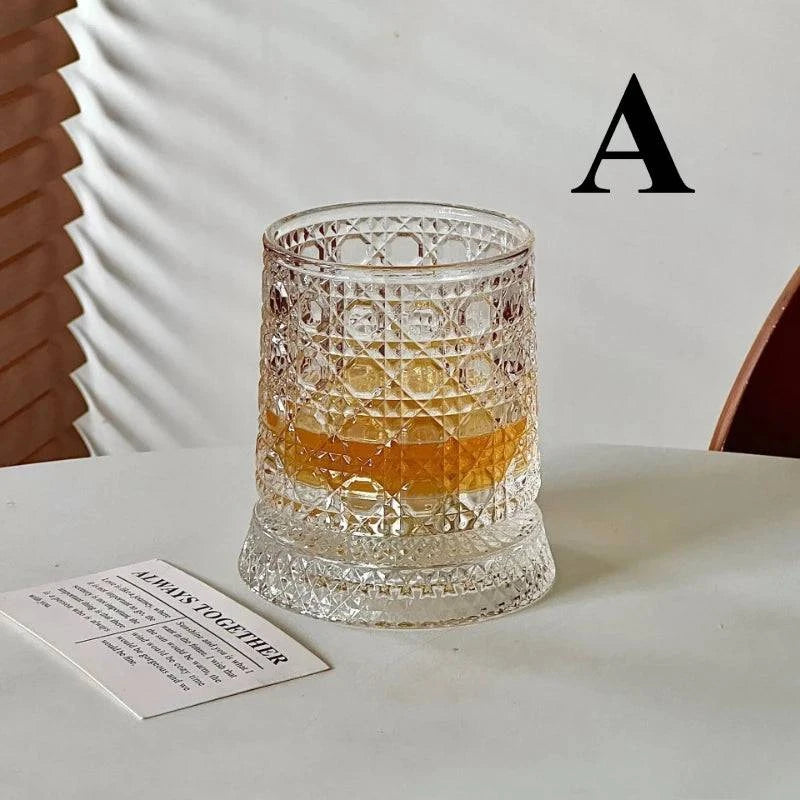 Nehwei enterprise 360° rotating crystal whisky glass with thick base, ideal for bourbon and scotch, showcasing a sleek, modern design.