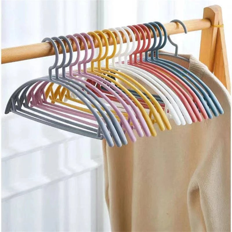 Plastic household clothes hanger with wide shoulders and semi-circular arc design, seamless hanging organizer by Nehwei enterprise.