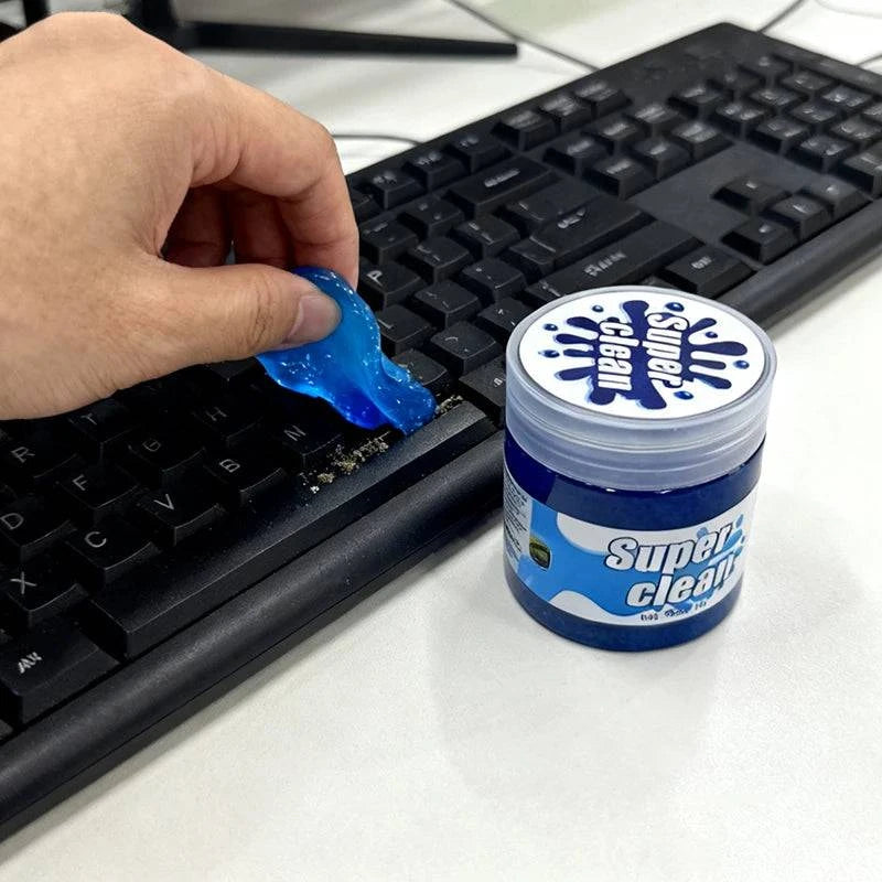 Blue reusable cleaning gel from Nehwei Enterprise used for cleaning keyboards, car vents, and small gaps, showing its flexible, gel texture.