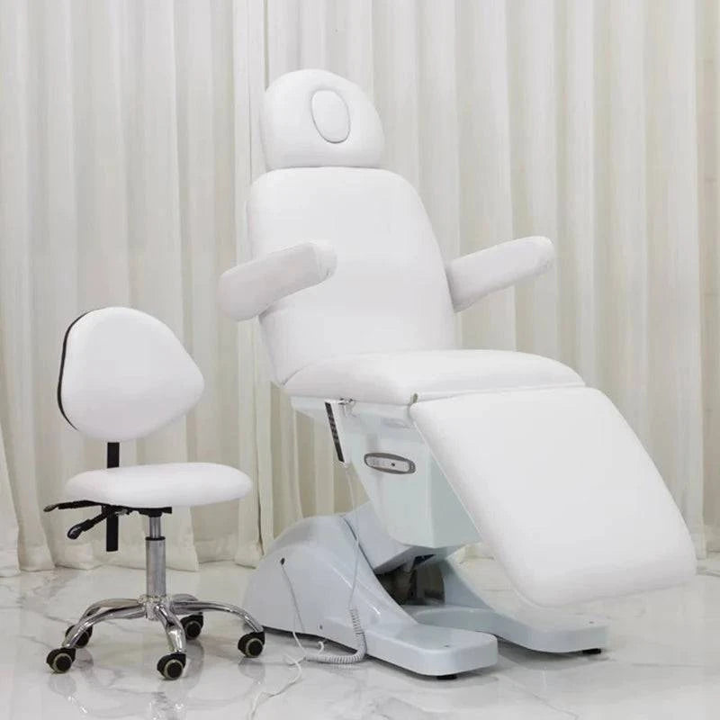 Luxury professional electric massage table by Nehwei Enterprise with modern design, adjustable height, and plush cushioning for aesthetic treatments.