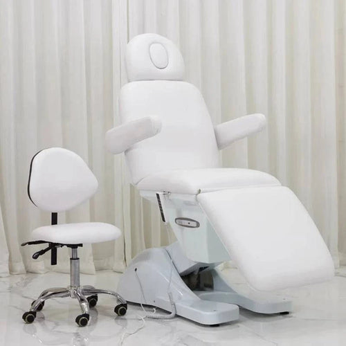 Luxury professional electric massage table by Nehwei Enterprise with modern design, adjustable height, and plush cushioning for aesthetic treatments.