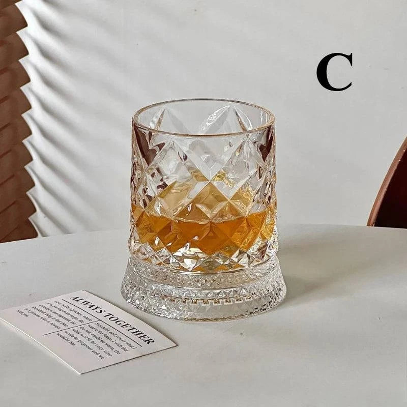 Nehwei enterprise 360° rotating crystal whisky glass with thick base, ideal for bourbon and Scotch, showcasing its unique design.