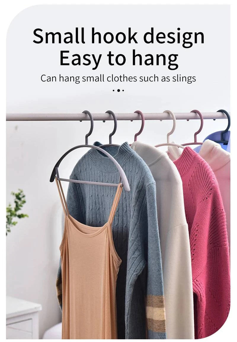 Plastic household clothes hanger with arc design and wide shoulders, semi-circular shape, seamless hanging organizer by Nehwei enterprise.