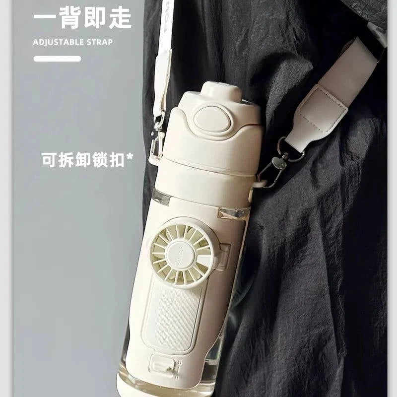 Nehwei enterprise 2-in-1 portable water bottle with fan mist spray and cooling cup for outdoor sports, leakproof design for kids and students.