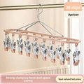 Stainless steel clothes drying rack with 20 clip capacity for socks, underwear, and clothes, featuring a sleek unmarked design.