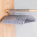 Plastic household clothes hanger with wide shoulders and semi-circular design, ideal for seamless organization by Nehwei enterprise